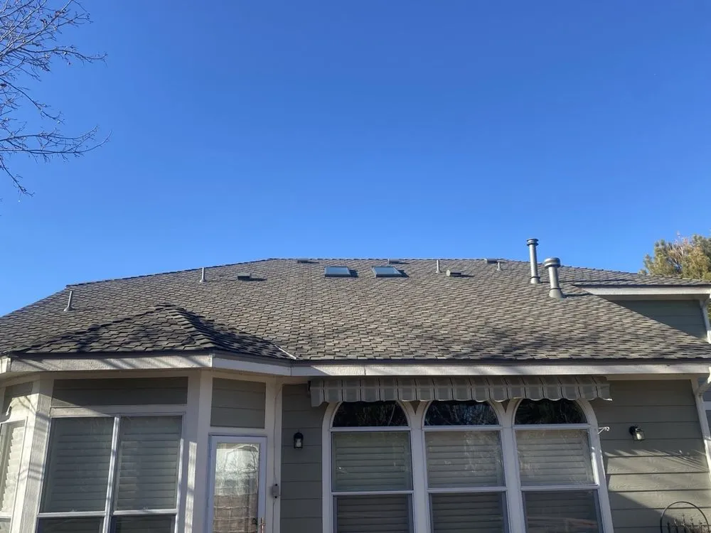 Slide of Birdie Roofing Company