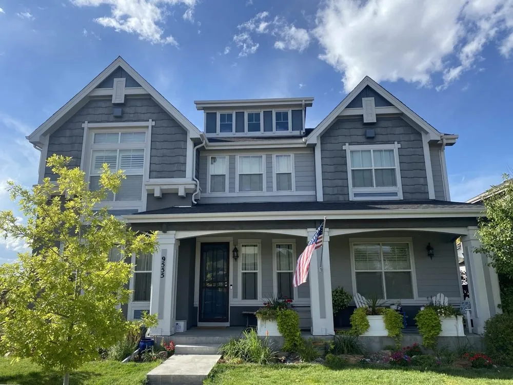 Slide of Birdie Roofing Company