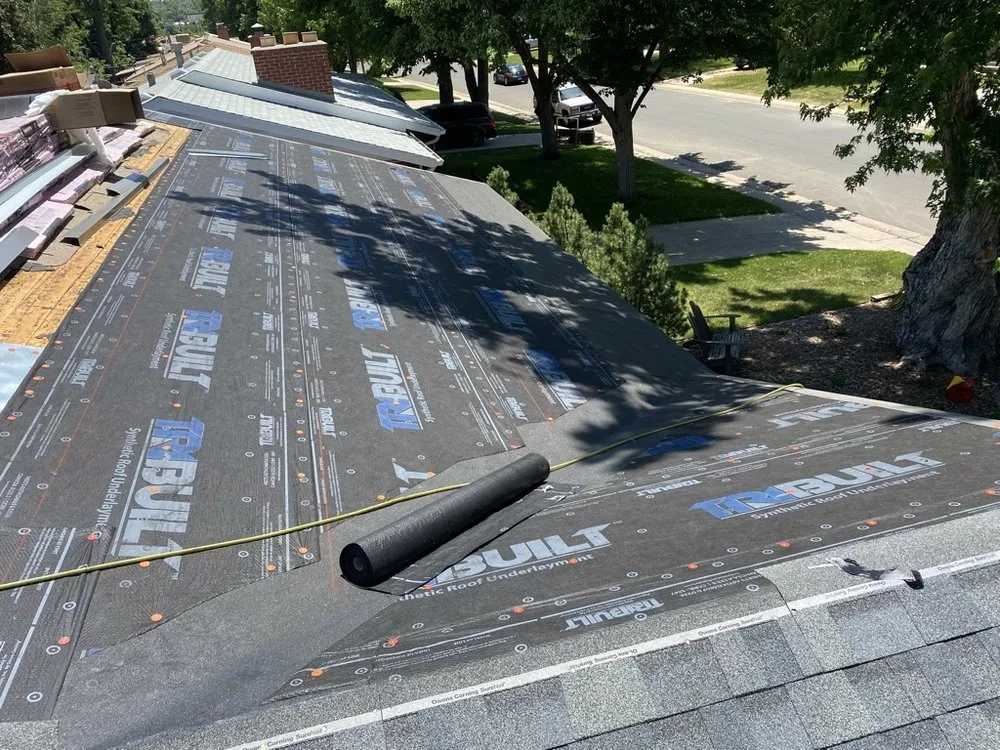 Slide of Birdie Roofing Company