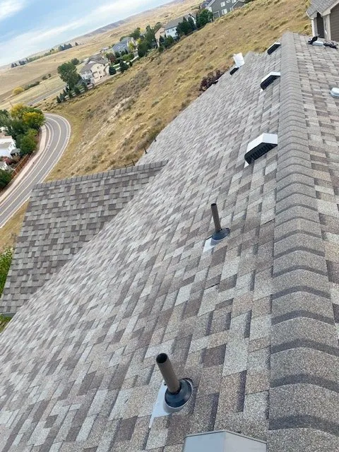 Slide of Birdie Roofing Company