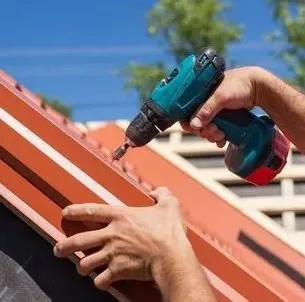 Professional storm damage roof repair in New Auburn, WI by Bjorkstrand Metal Roofing and Exteriors