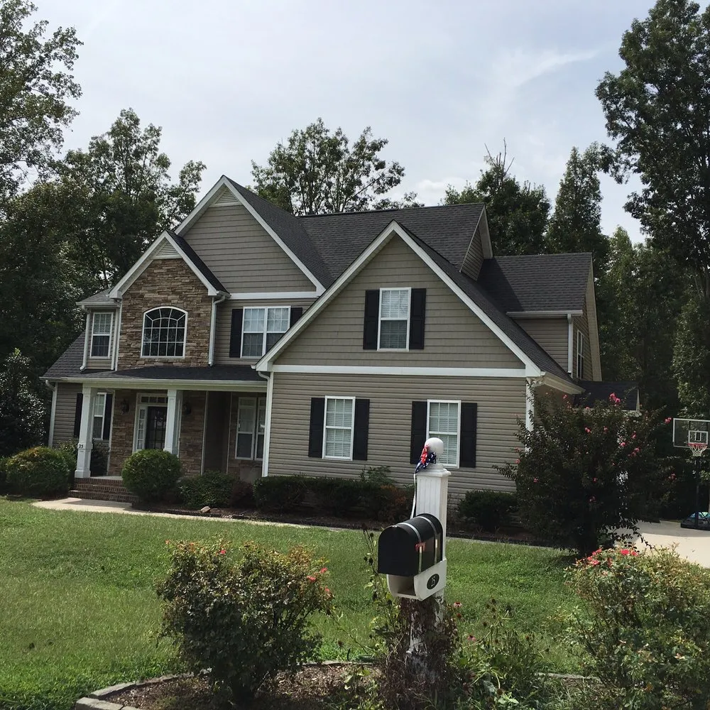 Slide of BK Roofing & Seamless Gutters