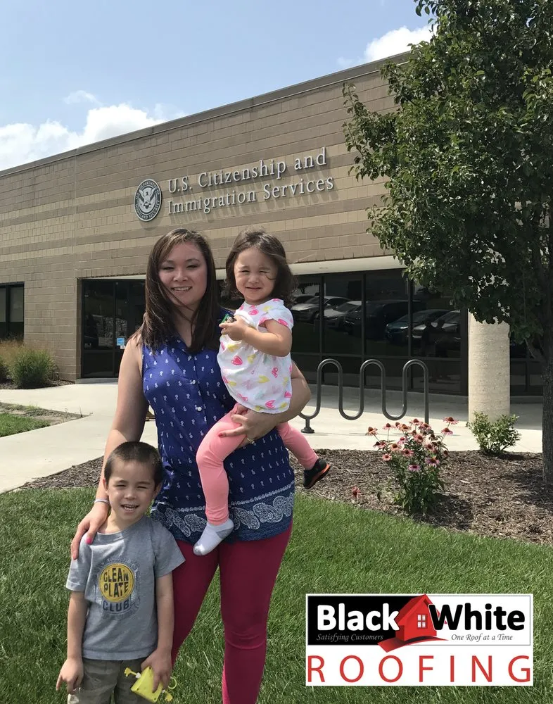 Slide of Black & White Roofing