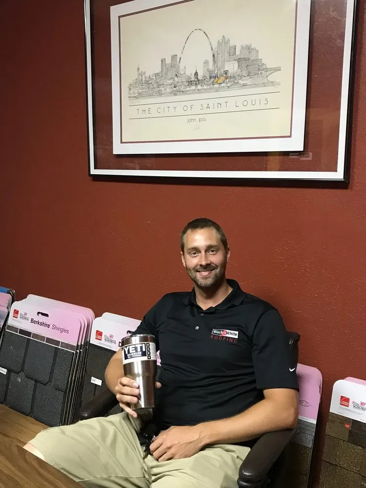 Slide of Black & White Roofing