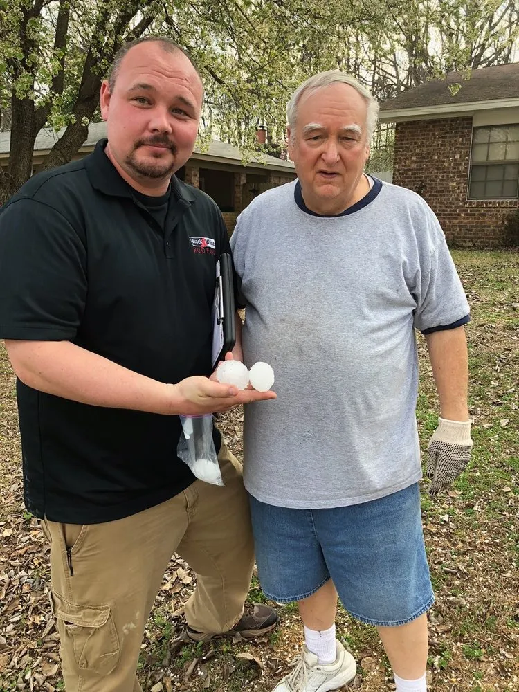 Slide of Black & White Roofing