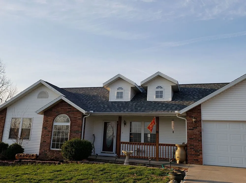 Slide of Black & White Roofing