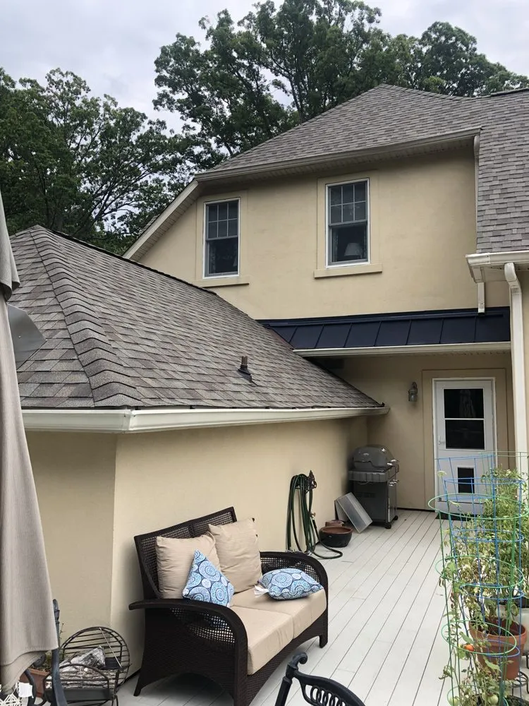 Slide of Black Anchor Roofing