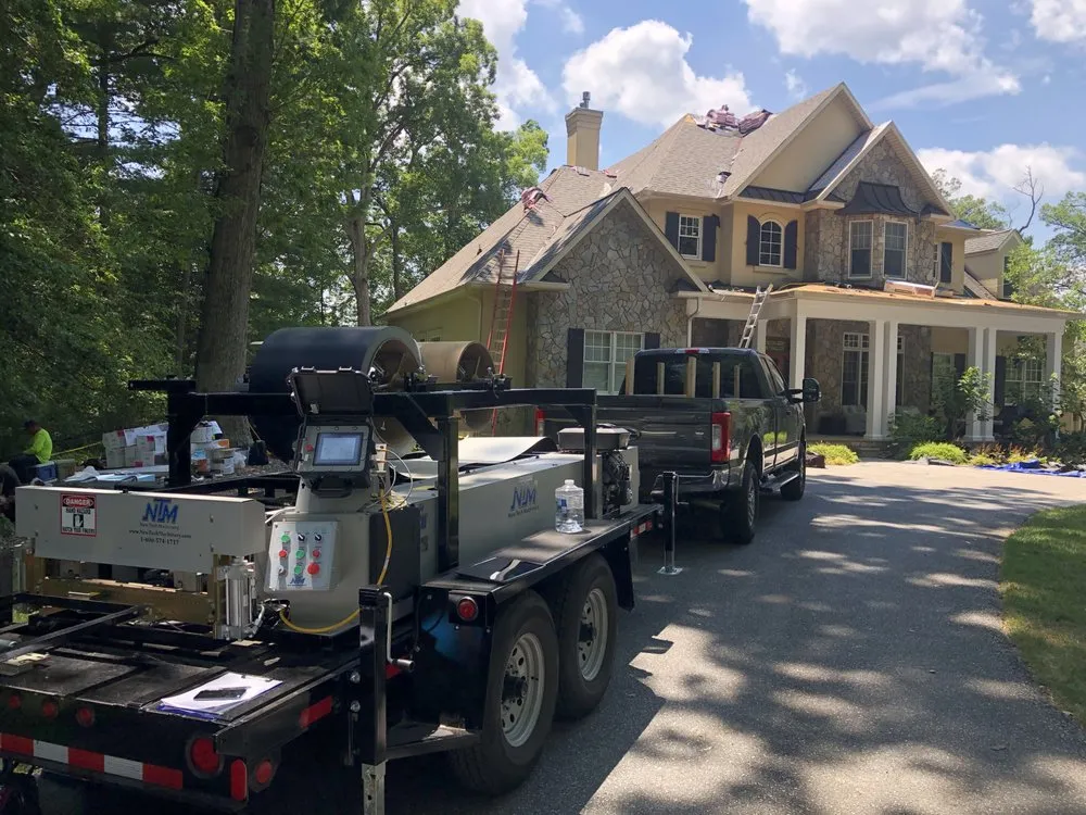 Slide of Black Anchor Roofing