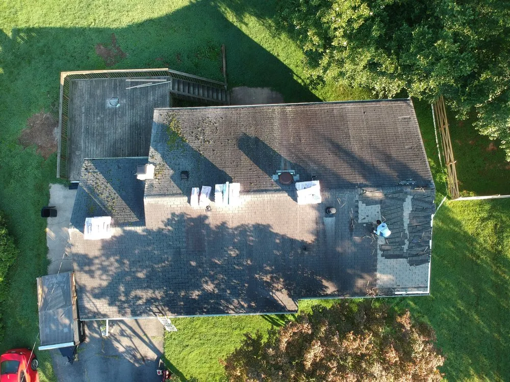 Slide of Black Anchor Roofing