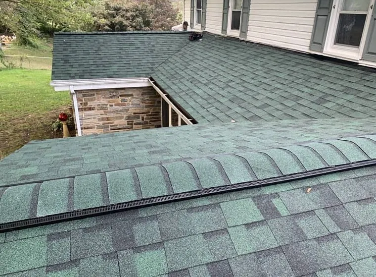 Slide of Black Anchor Roofing