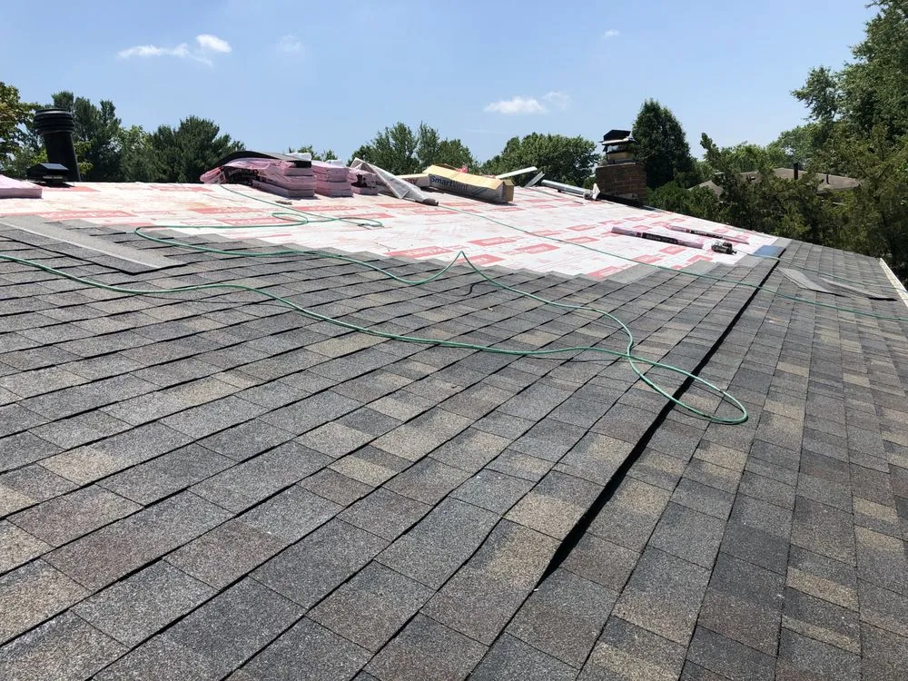 Slide of Black Anchor Roofing