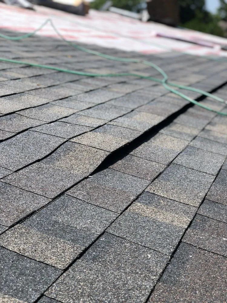 Slide of Black Anchor Roofing