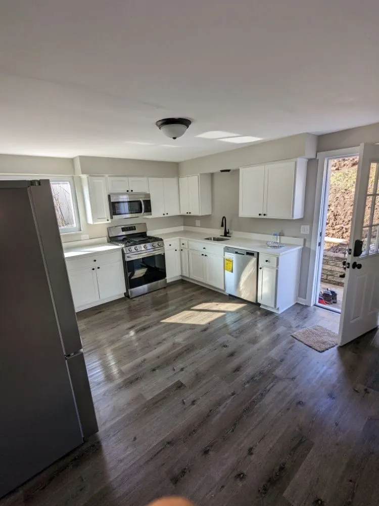 Slide of Black and White Renovations