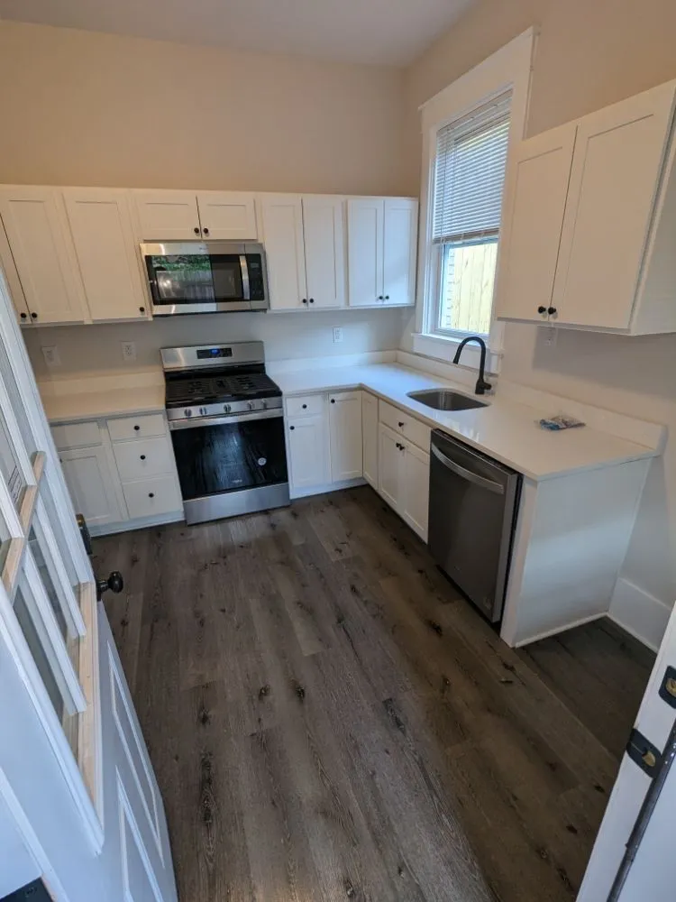 Slide of Black and White Renovations