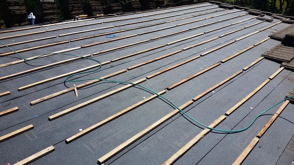 Slide of Black Diamond Roofing