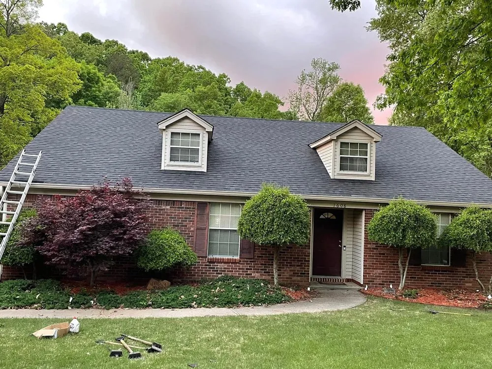 Slide of Black Label Roofing