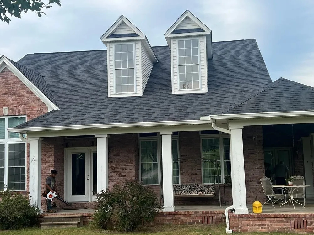 Slide of Black Label Roofing