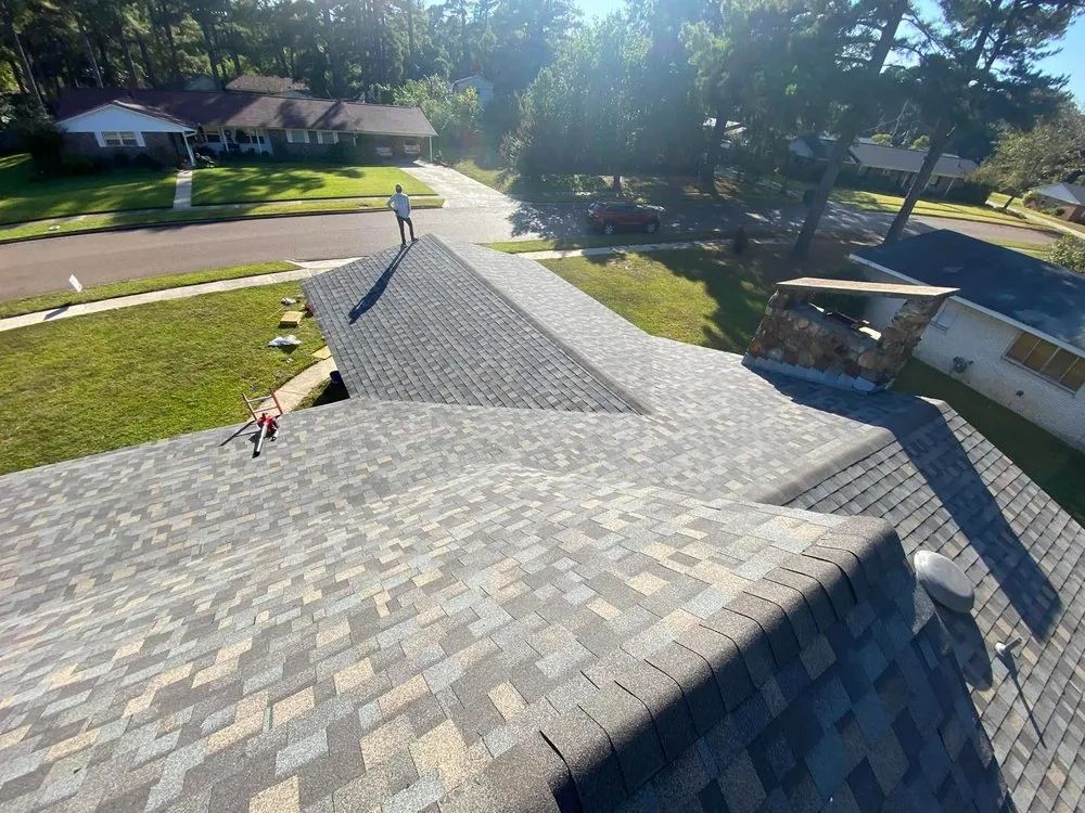 Slide of Black Label Roofing