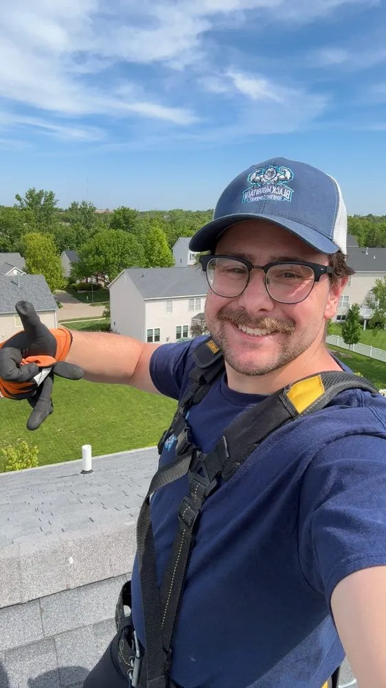 Slide of Black Mountain Roofing