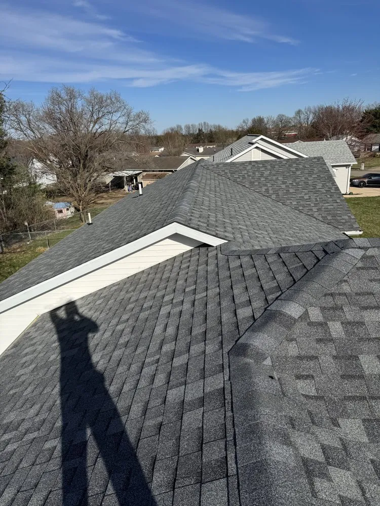 Slide of Black Mountain Roofing