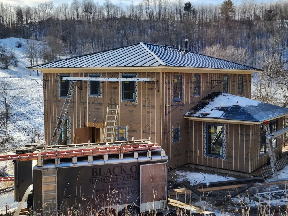 Slide of Black Ox Roofing