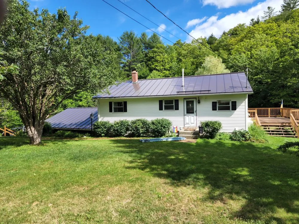 Slide of Black Ox Roofing