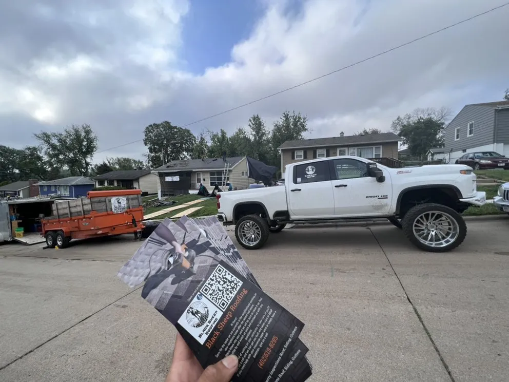 Slide of Black Sheep Roofing