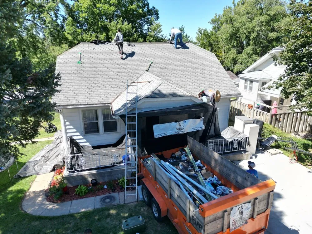Slide of Black Sheep Roofing
