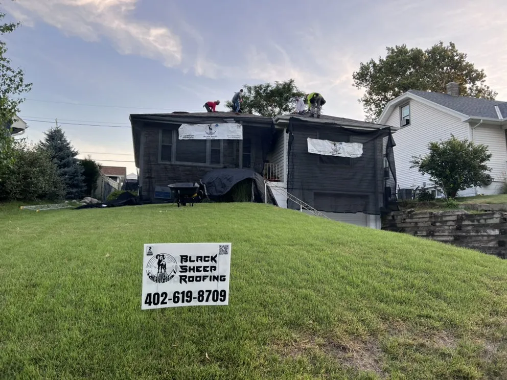 Slide of Black Sheep Roofing