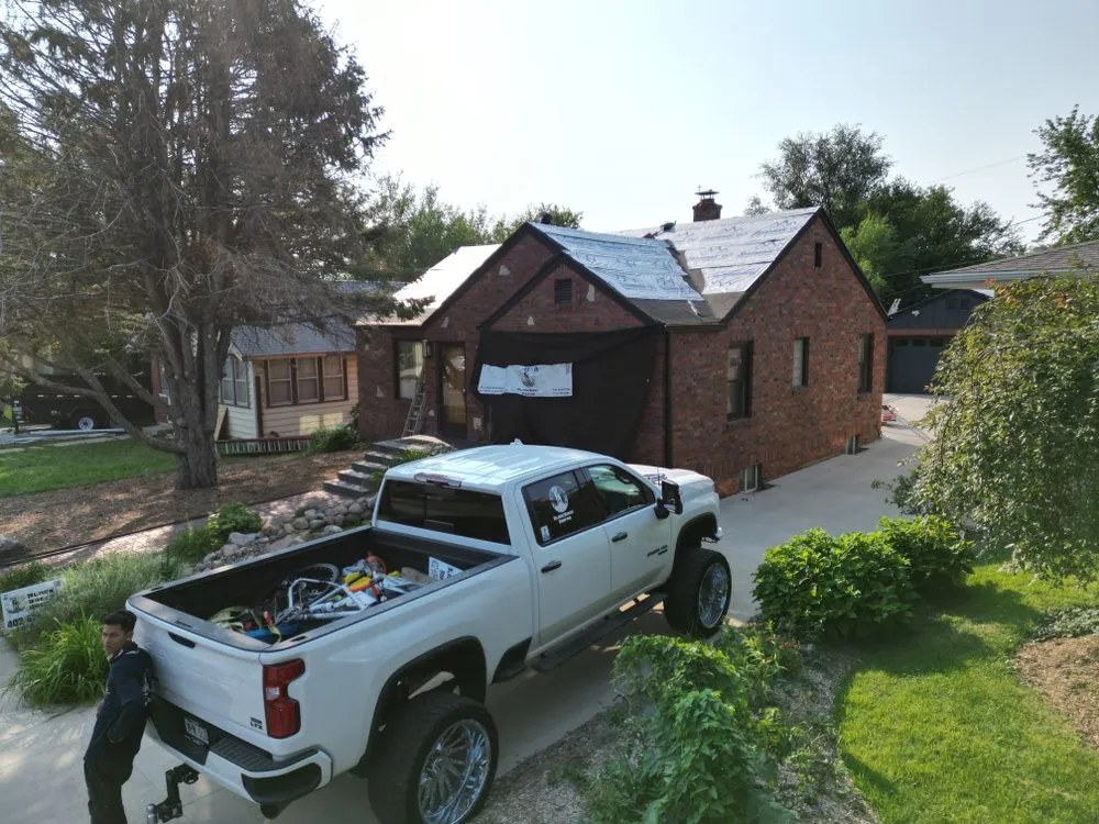 Slide of Black Sheep Roofing