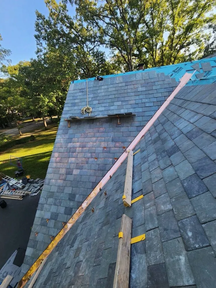 Slide of Black Square Roofing & Exteriors