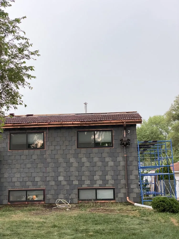 Slide of Black Square Roofing & Exteriors