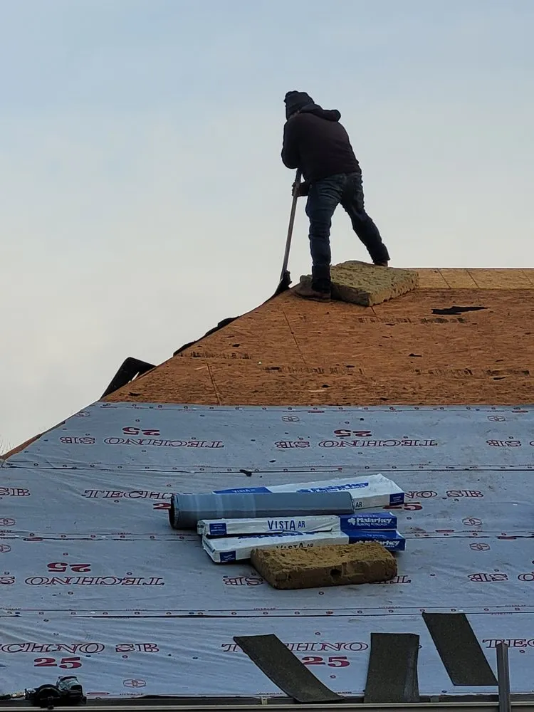 Slide of Blacksmith Roofing & Construction