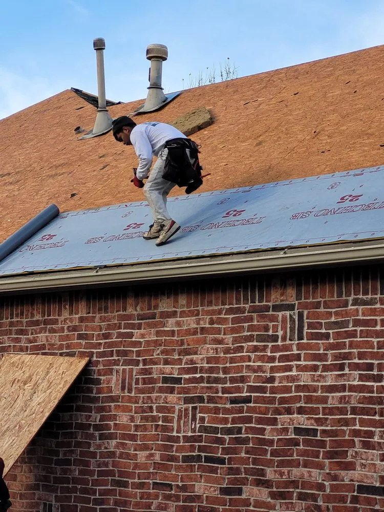 Slide of Blacksmith Roofing & Construction