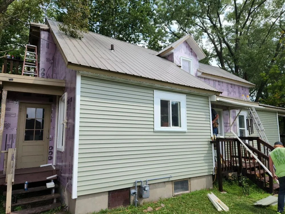 Top-rated roof replacement after storm damage in Poy Sippi, WI by Bleecker & Sons Construction LLC