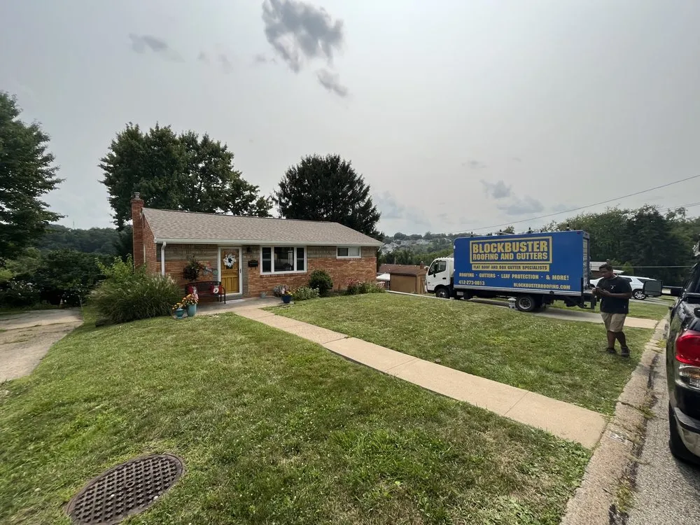 Slide of Blockbuster Roofing