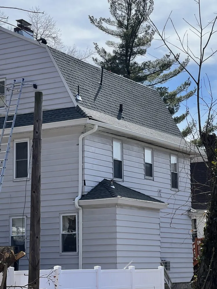 Slide of BLT Roofing & Gutters