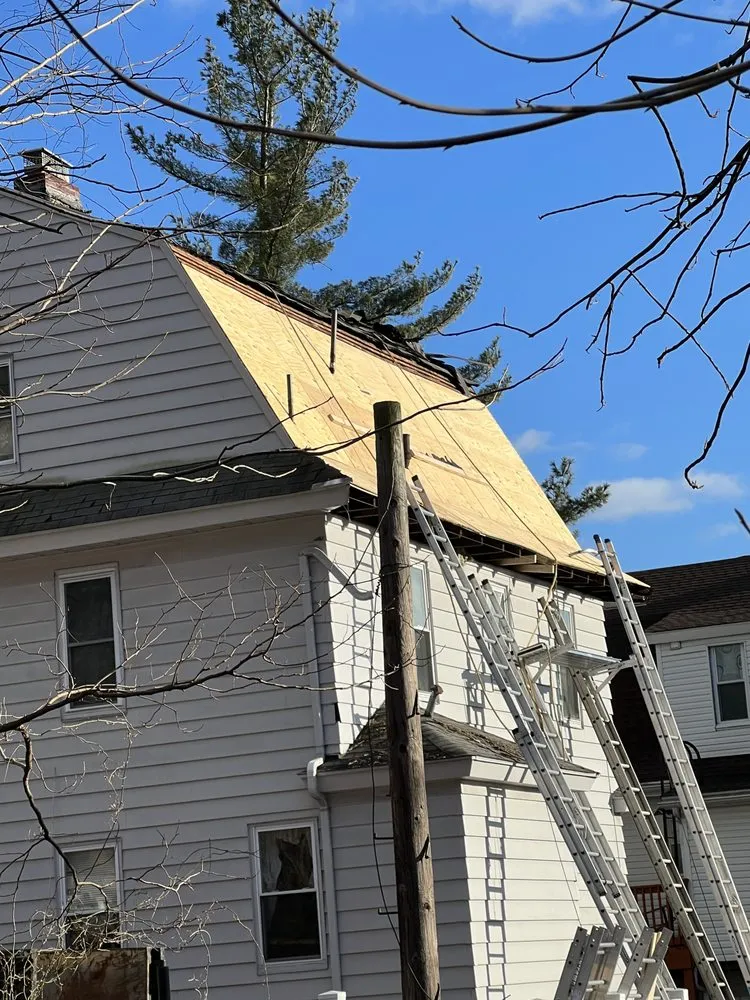 Slide of BLT Roofing & Gutters