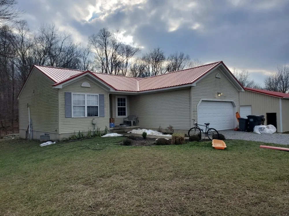 Slide of Blue Beaver Roofing