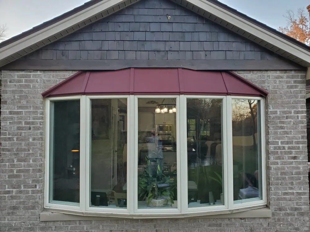 Slide of Blue Beaver Roofing