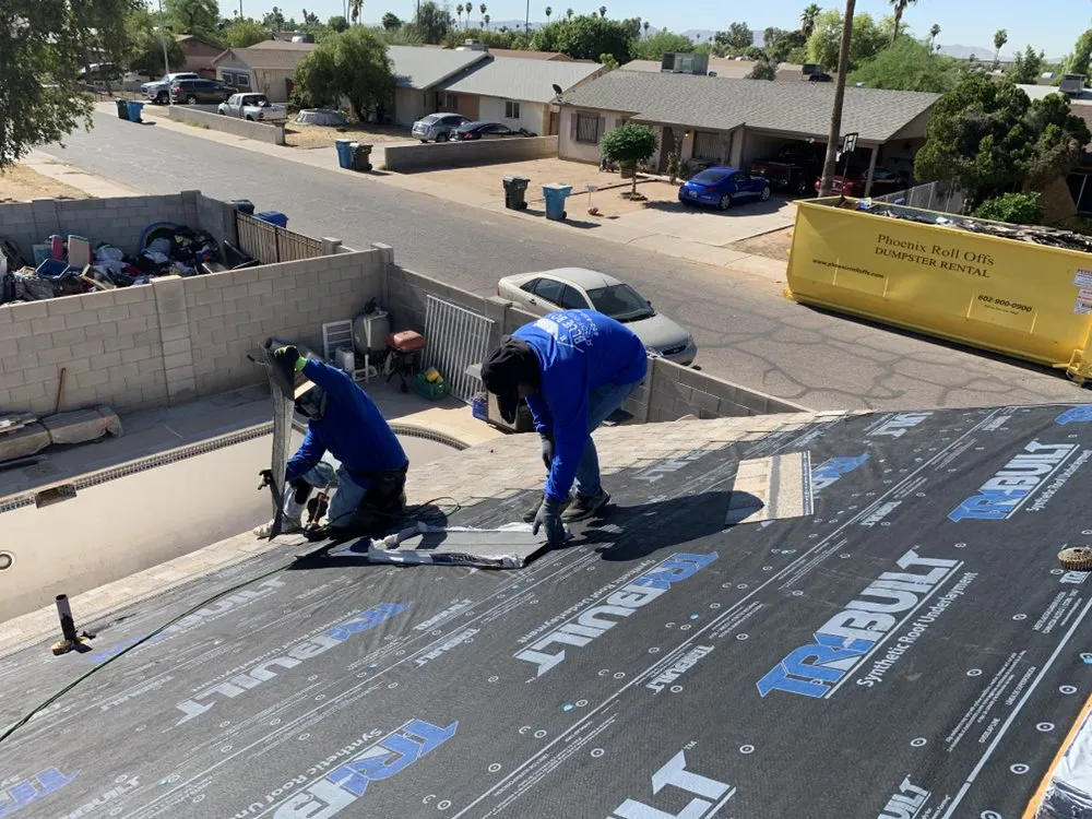 Slide of Blue Boy Roofing