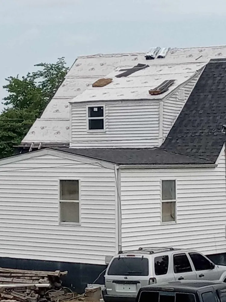 Slide of Blue Collar Roofing