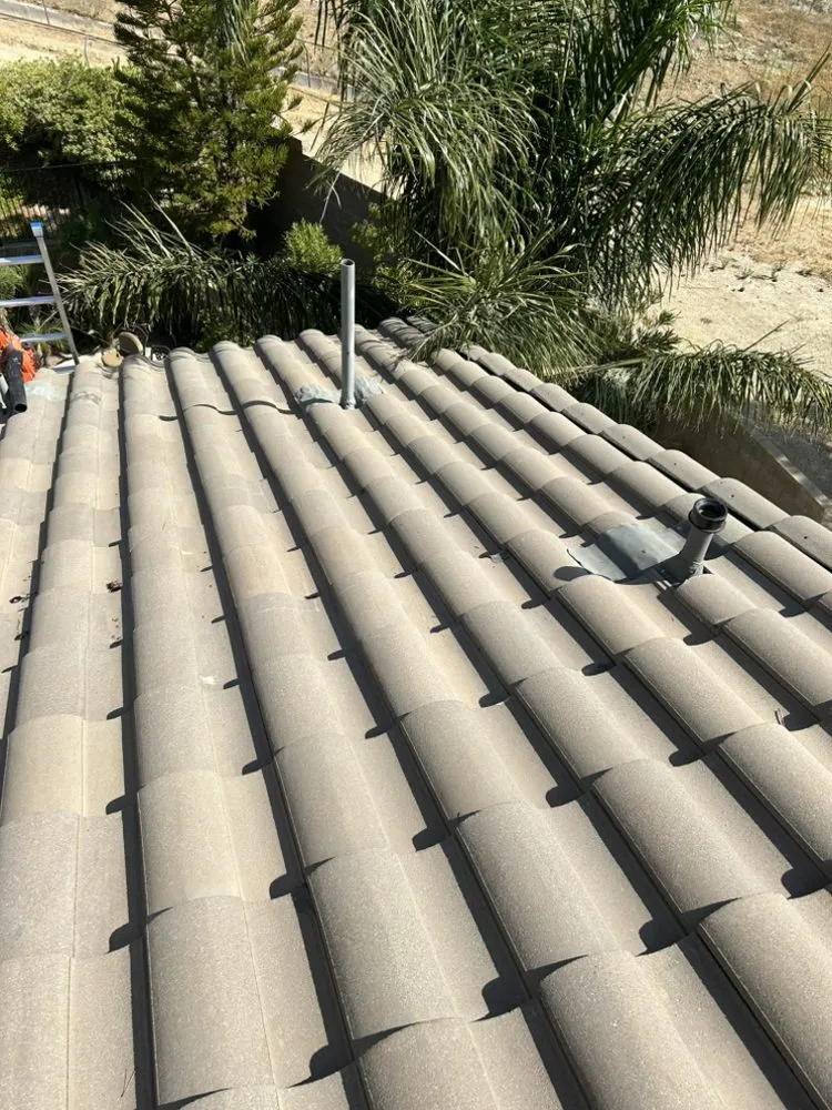 Slide of Blue J’s Roofing