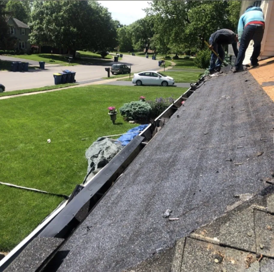Slide of Blue Ladder Roofing
