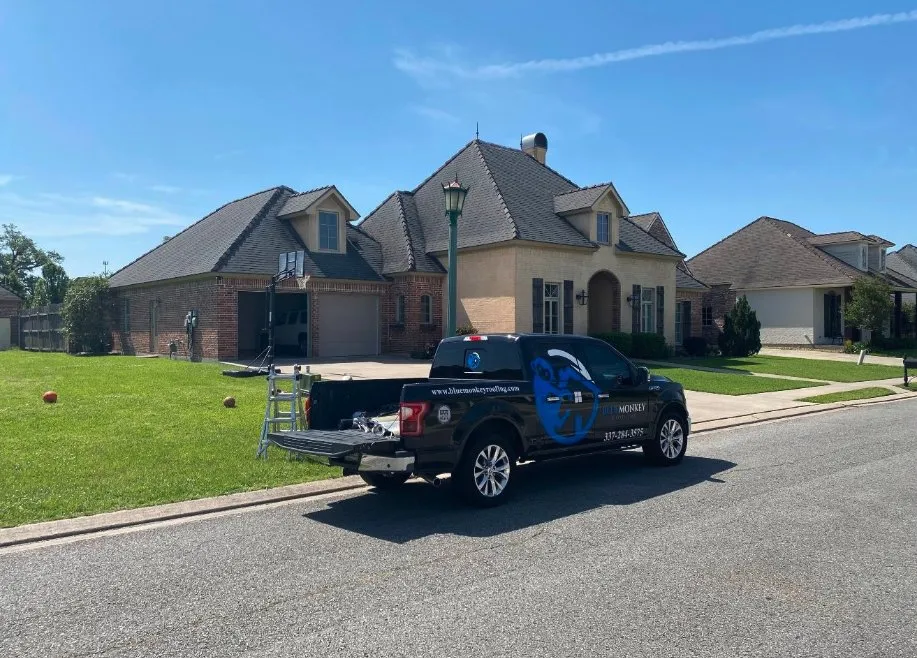 Slide of Blue Monkey Roofing