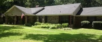 Slide of Blue Monkey Roofing