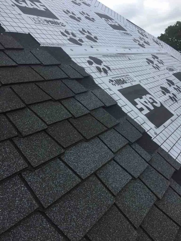 Slide of Blue Nail Roofing & Construction