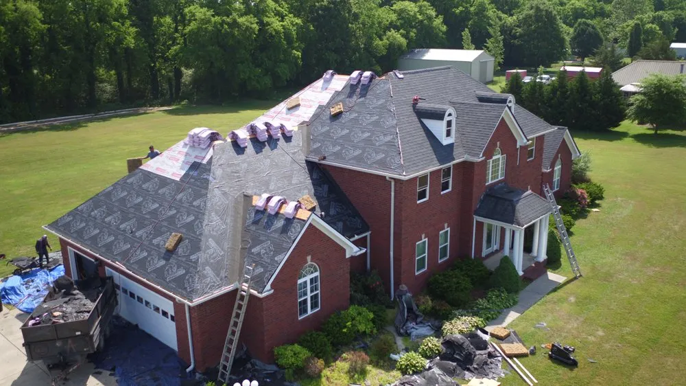 Expert storm damage roof repair with free inspection in Bell Buckle, TN by Blue Raider Roofing