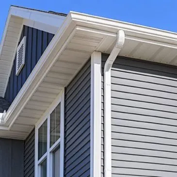 Slide of Blue Roofing and Gutters