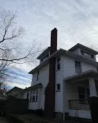 Slide of Blue Roofing and Gutters